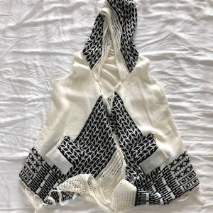 Hooded black and white fringe asymmetrical vest